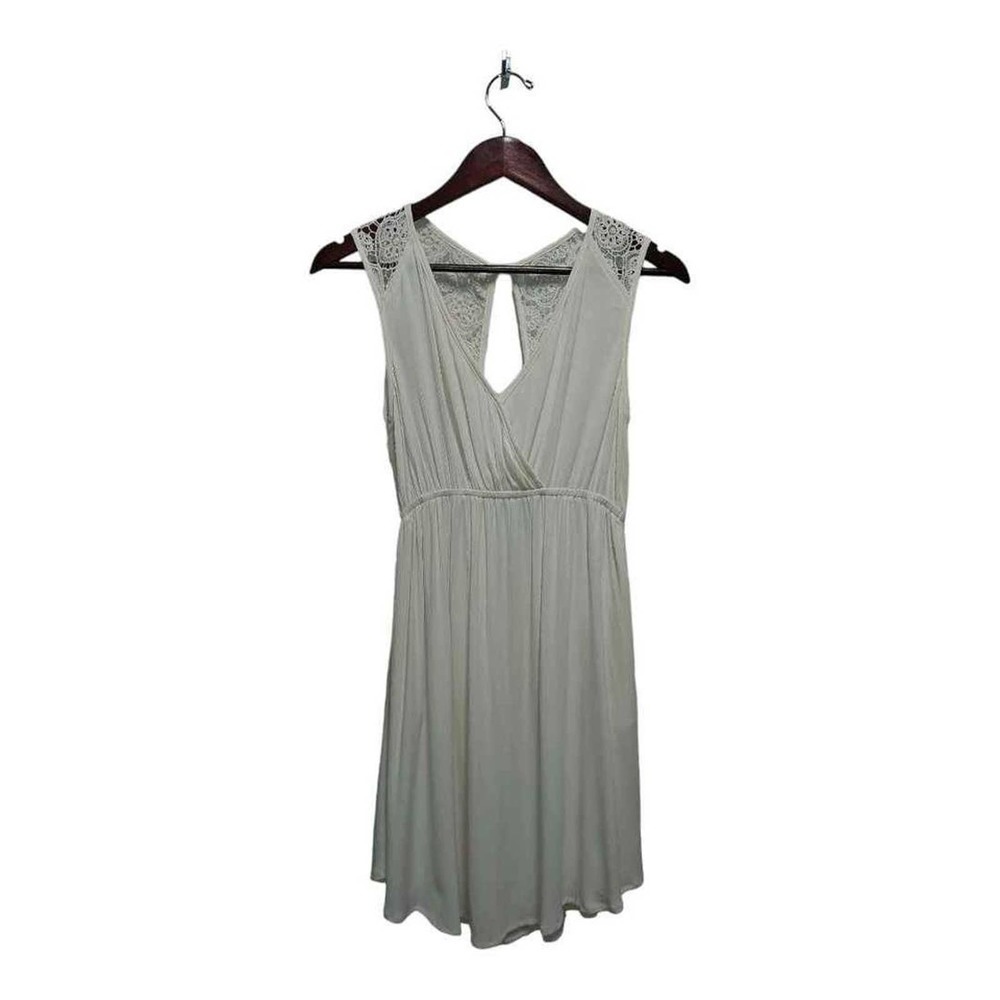 Sleeveless cream dress by‎ Mimi Chica.  Size small